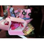 Seven Mattel Dolls, including Super woman, clothing:- One Box, pink aeroplane.
