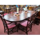 Mahogany Twin Pedestal Dining Table; together with six Hepplewhite style shield back dining chairs.