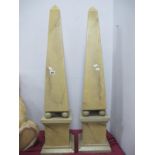 A Pair of Marble Effect Obelisks, on ball supports plus square platform bases, approximately 101