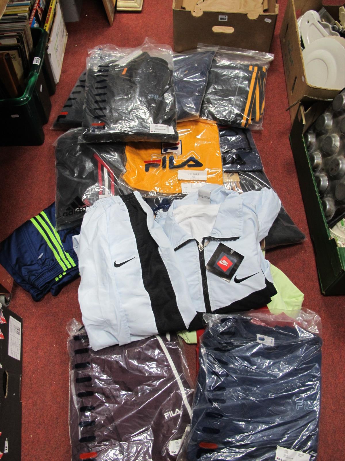 Sportswear; Fila - black track suit (XL), hooded zip top (L), navy sweater (L), three T-Shirts (XL);