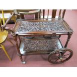 A Hardwood Two Tier Dinner Trolley, with brass inlay, two front wheels.