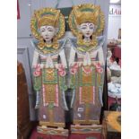 A Pair of Painted Wooden Wall Plaques, each as a crowned Indian female figure, much gilding,