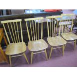 Ercol: Set of Four Blonde Comb Back Dining Chairs, the four central spindles running behind the seat
