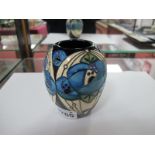 A Moorcroft Pottery Vase, painted in the 'Rennie Rose' (blue) design by Vicky Lovatt, shape 102/3,