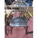 An Ash Elm Windsor Chair, with a hooped back, pierced splat rail supports on turned legs, united