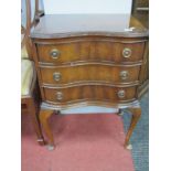 A Mahogany Serpentine Shaped Chest of Drawers, on cabrilole legs.