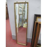 A Rectangular Shaped Gilded Mirror, with foliage decoration.