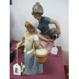 Lladro Pottery Figurine of a Lady Pouring Ewer, impressed 2336 27cm high, another of milkmaid