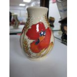 A Moorcroft Pottery Vase, painted in the 'Harvest Poppy' design by Emma Bossons, shape 7/3 impressed