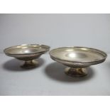 A Pair of Hallmarked Dishes, Walker & Hall, Sheffield 1925, each of plain circular form with