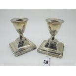 A Pair of Hallmarked Silver Dwarf Candlesticks, WL&S, Sheffield 1908, each on spreading square (