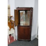 A Mahogany Bow Fronted Corner Cupboard, with low back.
