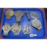 Five A.A Car Badges, two R.A.C badges and a female car mascot:- One Tray