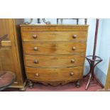 XIX Century Mahogany Bow Front Chest of Three Graduated Drawers, having turned handles, shaped apron