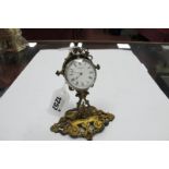 Waltham Silver Cased ladies Fob Watch; together with gilded cast metal scrollwork watch stand.