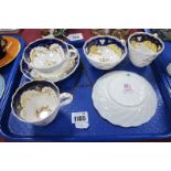 Rockingham Pottery Trio, comprising saucer (cracked) bearing puce dragon stamp, coffee and tea cups,