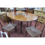 Set of Four G Plan 1970's Teak Dining Chairs, with curved rail backs, an extending teak dining table