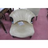 Early XX Century Nursing Chair, with ebonized frame fanned back, upholstered in a beige velvet.