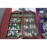 A Large Quantity of Novelty Spoons in Two Display Cases.