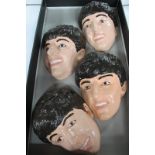 The Beatles Painted Plaster Heads of the FAB 4, approximately 12.5cm x 90.5cm.