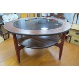 1970's Circular Coffee Table, with smokey glass inset top and solid undershelf, 84cm diameter.
