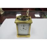 French Brass Carriage Clock, black Roman numerals to white dial, 'DH' to back plate, engraved to