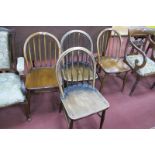 Ercol; Four Hooped Back Dining Chairs, with spindles and 'H' stretchers (three stamped "290").