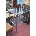 Chrome Two Tier Trolley, having glass trays, 86.5cm high.