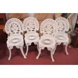 Set of Four White Painted Metal Patio Chairs.