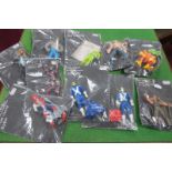 Ten Plastic Model Action Figures, mainly with comic book themes to include X-Men, Sabre Tooth,