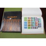 An Albany Stamp Album, housing a mint and used collection of GB stamps from Queen Victoria, line