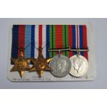 A WWII Set of Four Medals, comprising 1939-45 Star/France Germany Star/War Medal/Defence Medal,