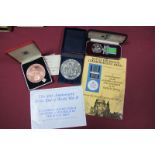 A Royal Mint Bronze 40th Anniversary End of WWII Medal, case, a Battle of Britain Commemorative