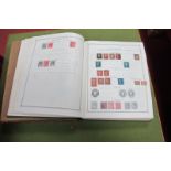 The Ideal Postage Stamp Album Volume 1 to 1914, housing a used collection of stamps. Plus a few