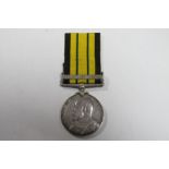 An Edward VII Africa General Service Medal, with Somaliland 1908-10 clasp, rim badly damaged - may