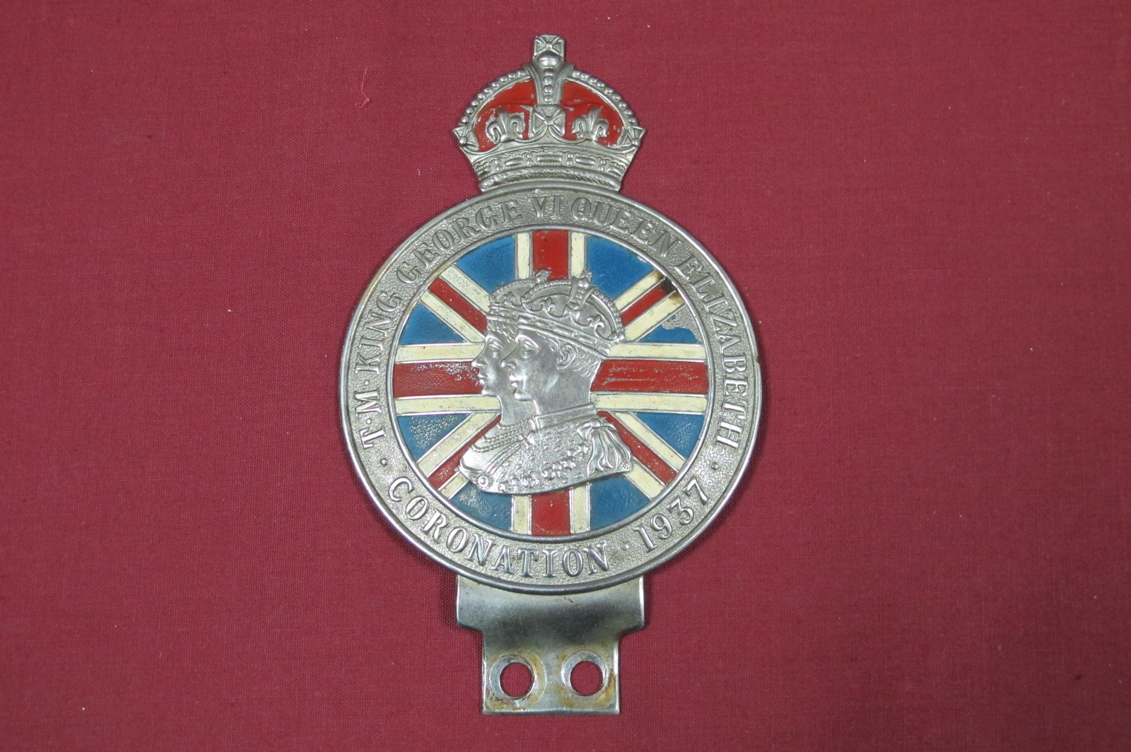 A 1937 Coronation Car Bumper Badge.