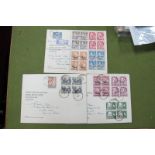 K.U.T. Three First Day Covers with SG 167-180 to £1, with some blocks of four.