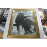 Fats Domino Autograph, blue pen signed on a black and white image of him playing the piano,