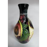 A Moorcroft Pottery Vase, painted in the 'Queens Choice' design by Emma Bossons, shape 372/6,