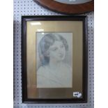 An Early XX Century Pencil Sketch Head and Shoulders Portrait of a Lady, signed and dated lower left