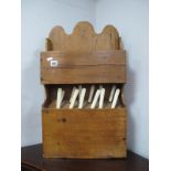 XIX Century Pine Wall Cutlery Rack, containing twelve pieces, 38.5cm wide.