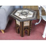 A Middle Eastern Hardwood Coffee Table, of hexagonal form, early to mid XX Century, with allover