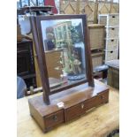 Mahogany Swing Dressing Mirror, on slope supports and breakfront base, having three drawers, on ogee