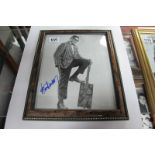 Bo Diddley Autograph, blue pen signed on a black and white image of him with guitar, unverified.