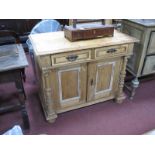 Early XX Century Pine Continental Two Door Cupboard, with two drawers and turned side pillars,