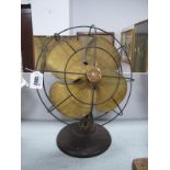 General Electric Brass Fan, on brown bakelite base, stamped M4.