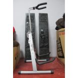 Fender Guitar Stand, pair of cast iron fire place supports, decorated with country figures, 77cm