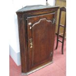 Georgian Oak Corner Wall Cupboard, with stepped pediment, raised panelled door, shaped inner,