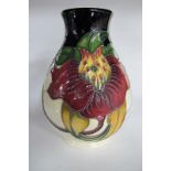 A Moorcroft Pottery Vase, painted in the 'Anna Lily' design by Nicola Slaney, shape 7/5, impressed