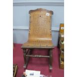 Early XX Century Child's Rocking Chair, with 'Baby' and other decoration, formed by cut out holes to